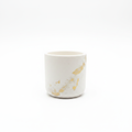 Pot blanc et or – fond blanc Google